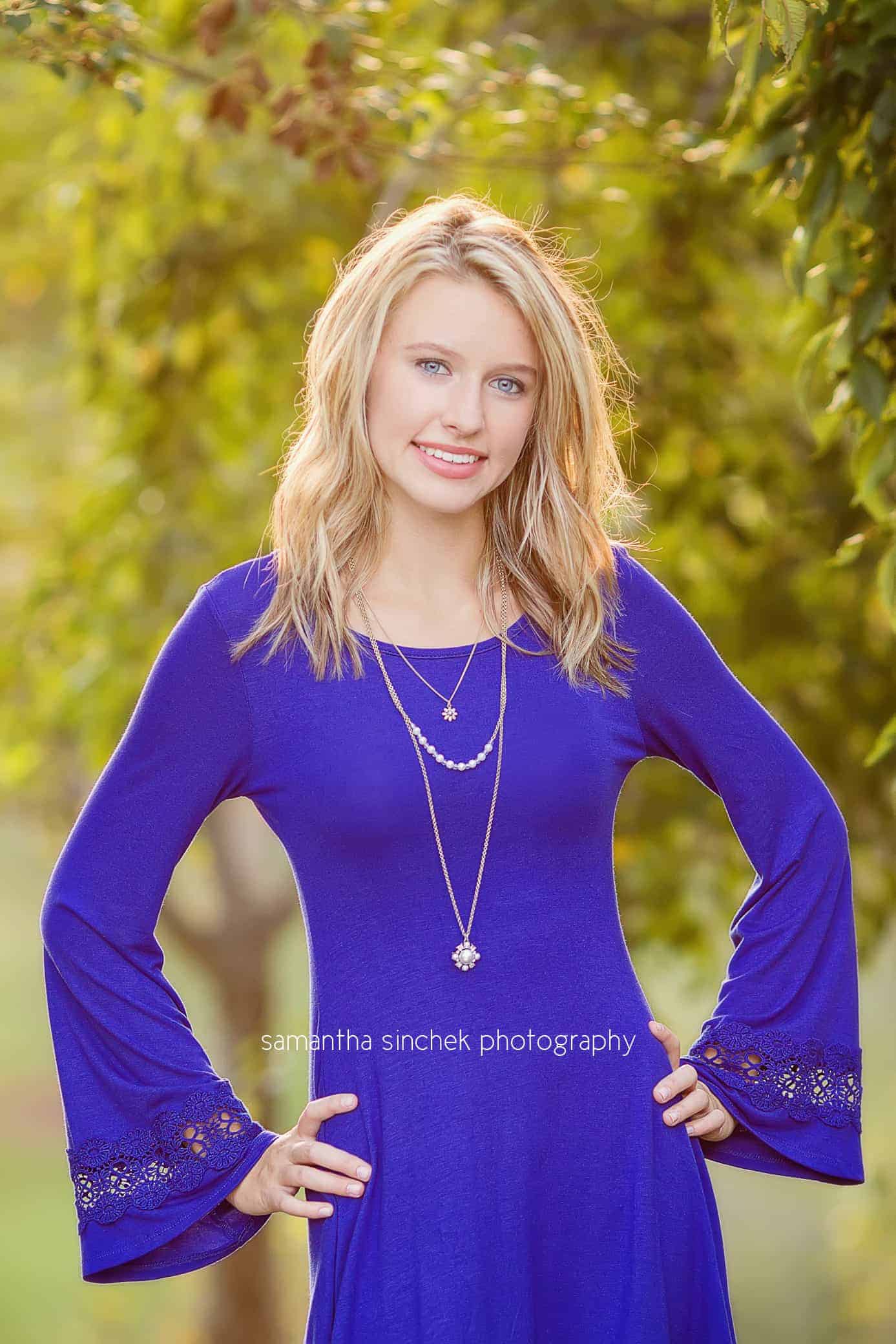 senior girl wears blue dress