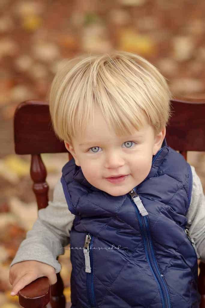 boy smiles at camera at sharon woods