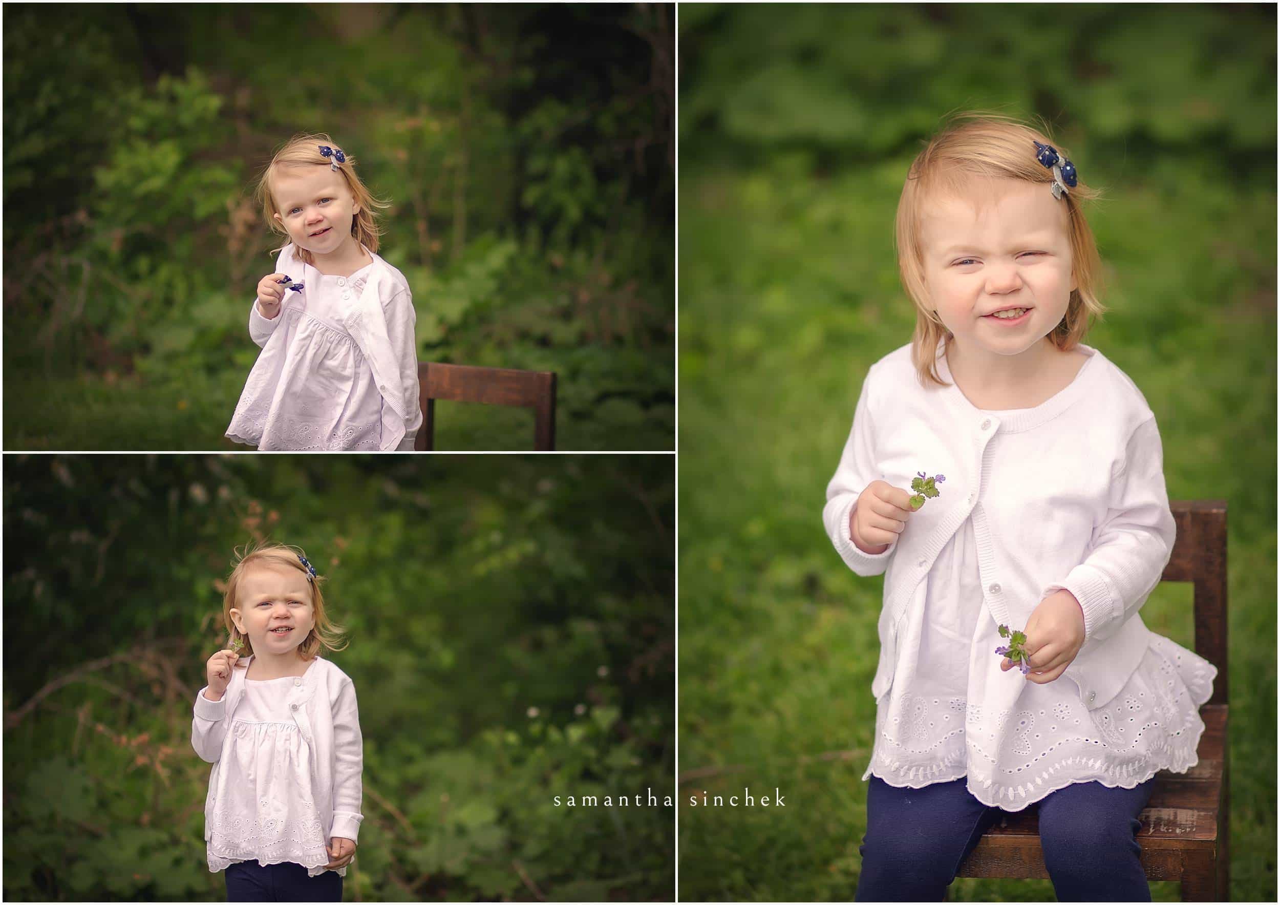 YOUNG DAUGHTER HOLDS A FLOWER AT CINCINNATI FAMILY SESSION