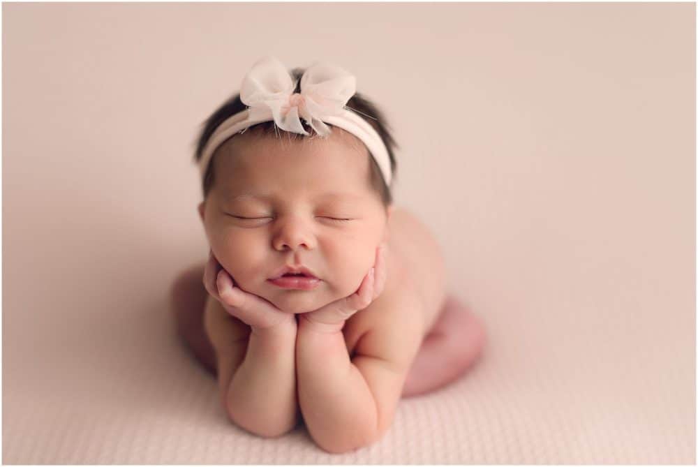 top rated cincinnati newborn photographer Samantha sinchek captures baby girl at her loveland ohio studio