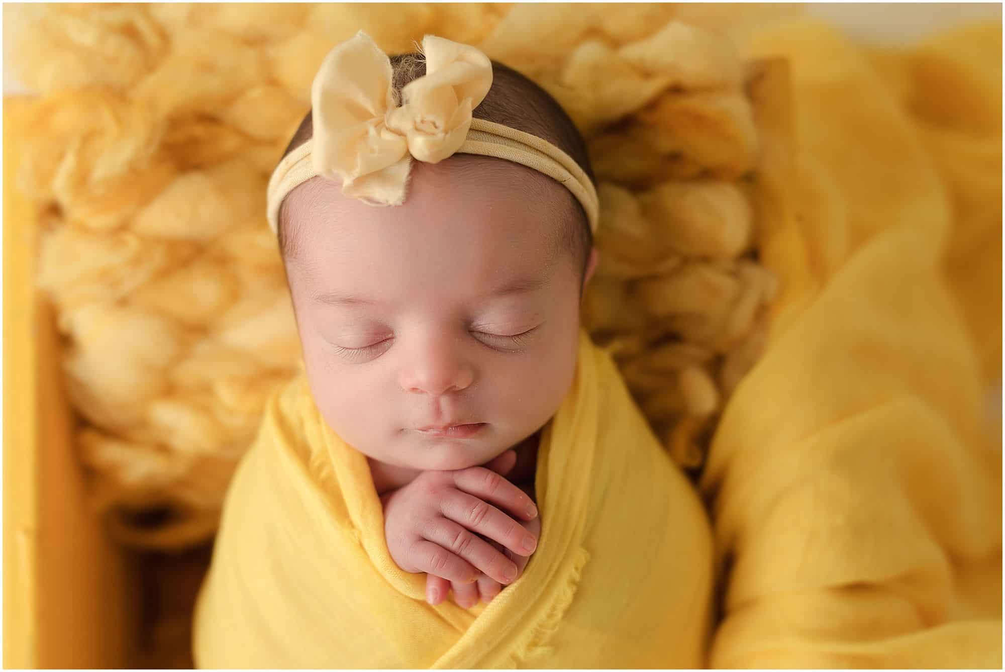 little ray of sunshine at newborn pictures at cincinnati ohio Samantha sinchek photography